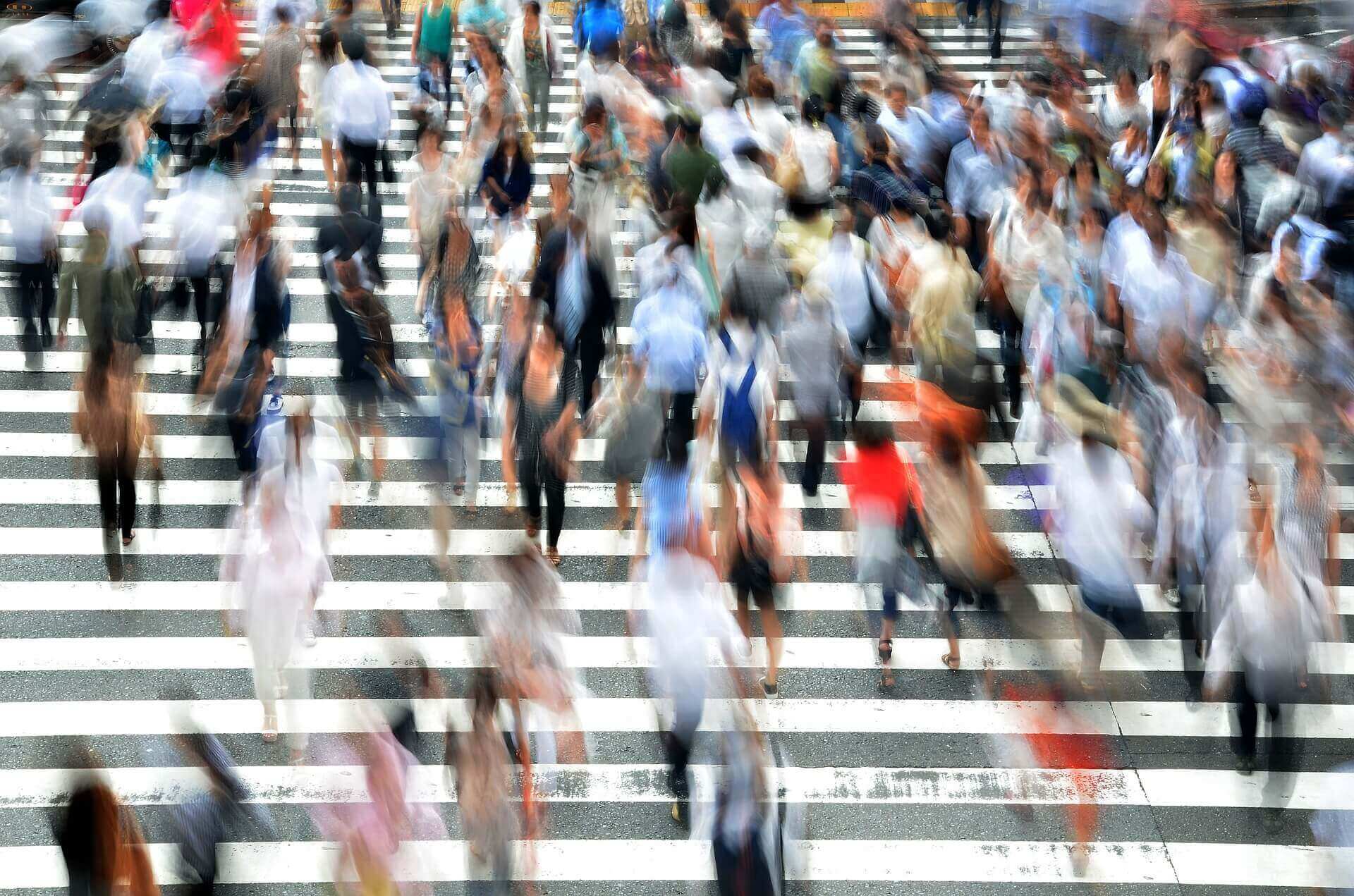 Pedestrians at Shibuya Crossing in Tokyo Japan