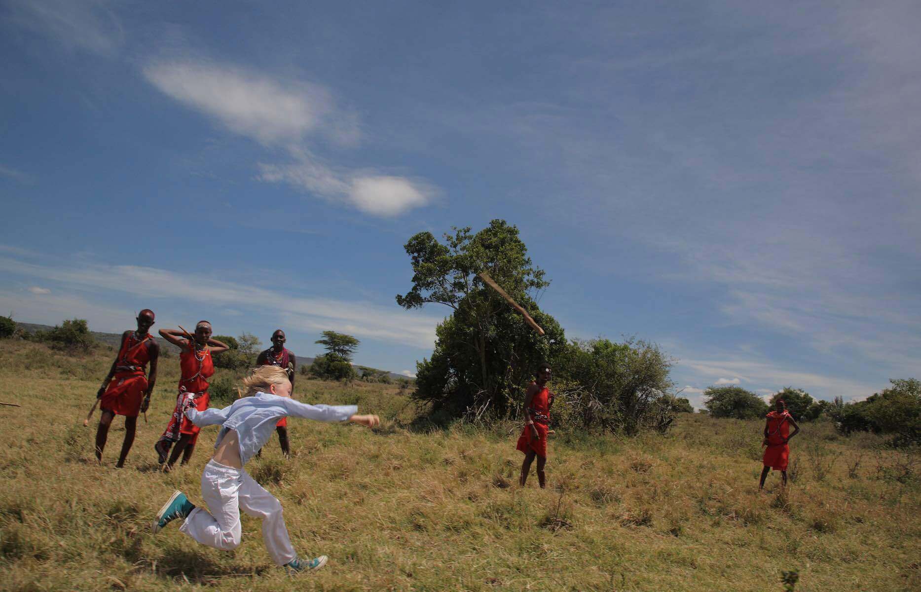 Saruni Mara Warriors Academy with a child playing